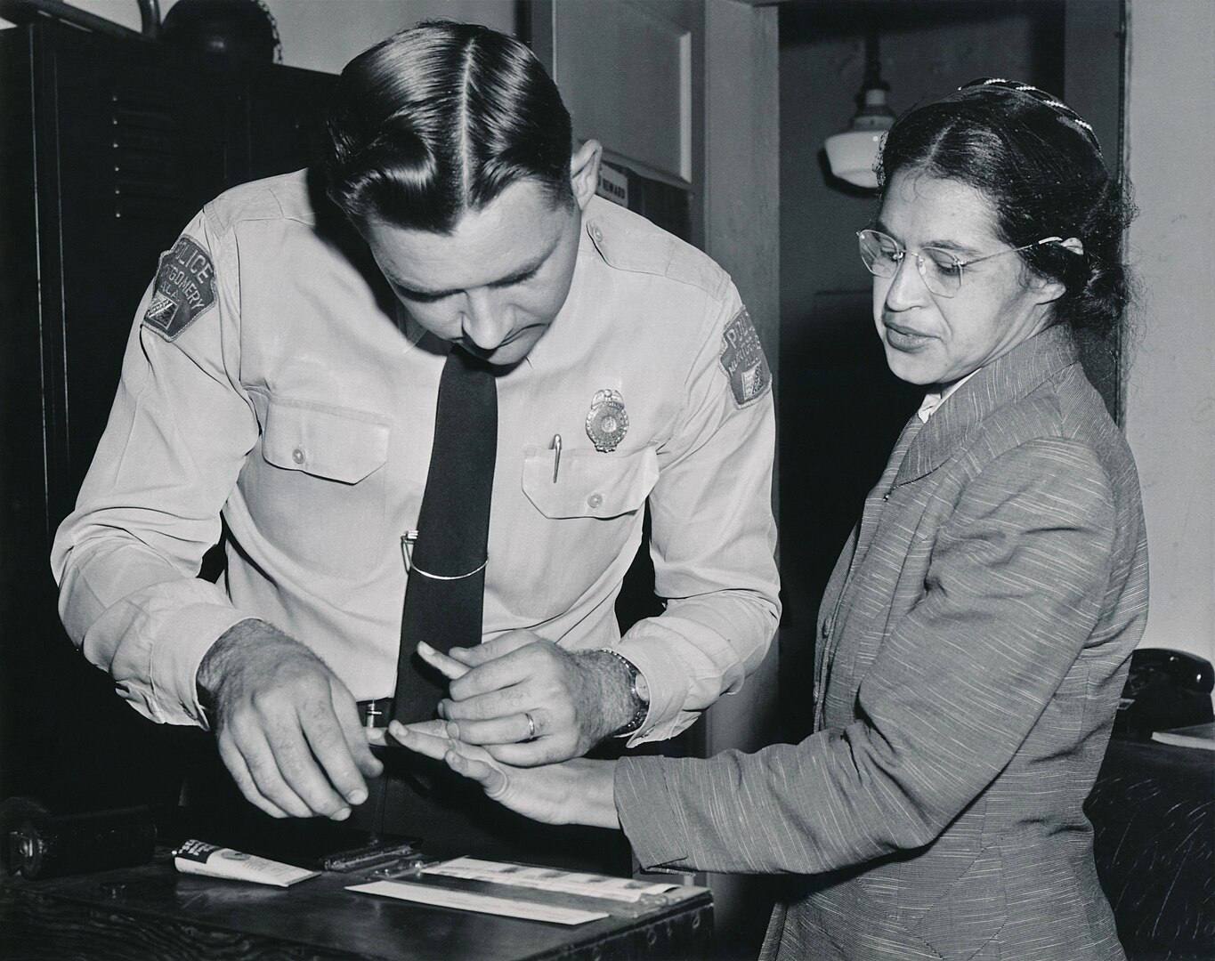 Civil Rights/1365px-Rosa_Parks_being_fingerprinted_by_Deputy_Sheriff_D.H._Lackey_after_being_arrested_on_February_22,_1956,_during_the_Montgomery_bus_boycott.jpg